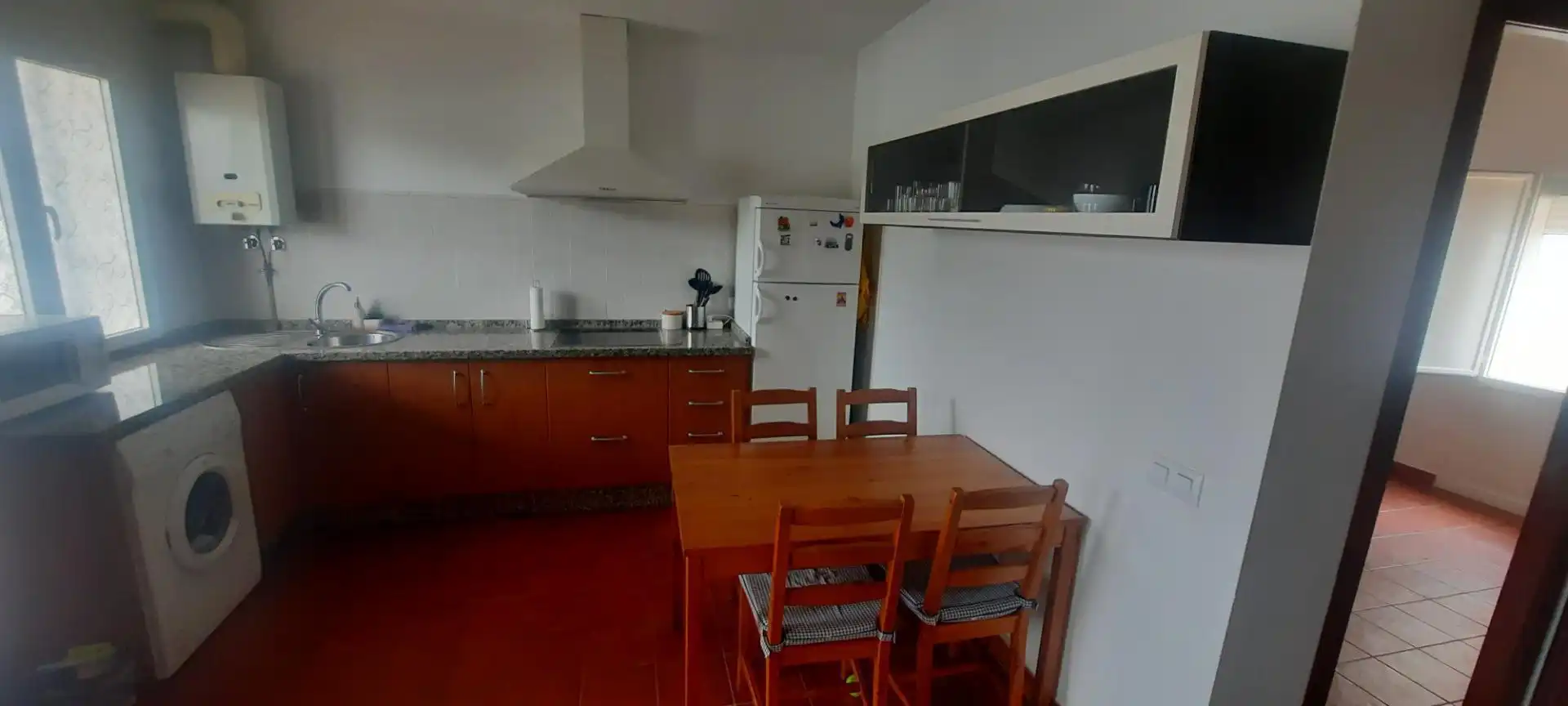 Cuina de Apartament en venda en El Pedroso amb Calefacció, Jardí privat i Moblat