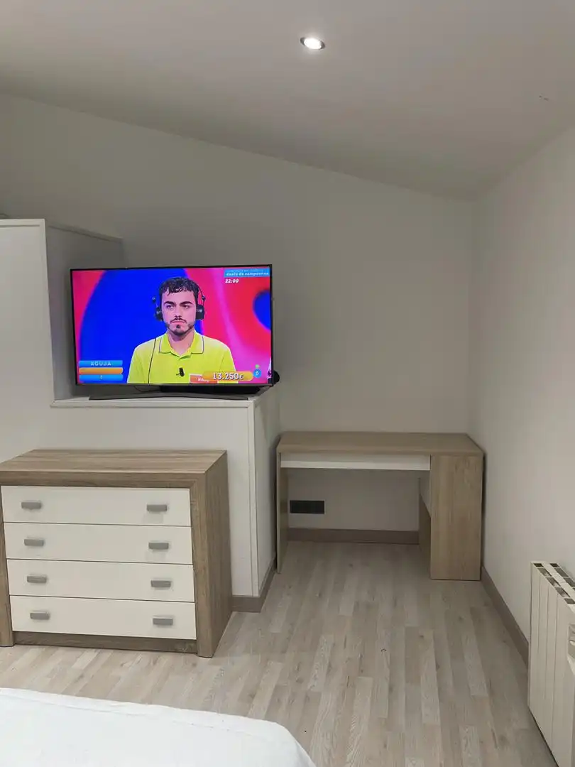Sala de estar de Casa adosada en venta en Santiago de Compostela  con Calefacción, Parquet y Trastero