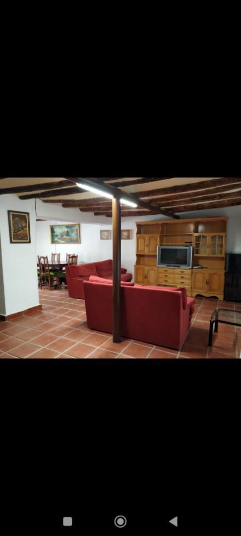 Sala de estar de Casa adosada en venta en San Esteban de Litera con Terraza, Trastero y Amueblado