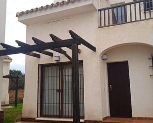 Exterior view of Single-family semi-detached for sale in El Ronquillo  with Air Conditioner, Terrace and Swimming Pool