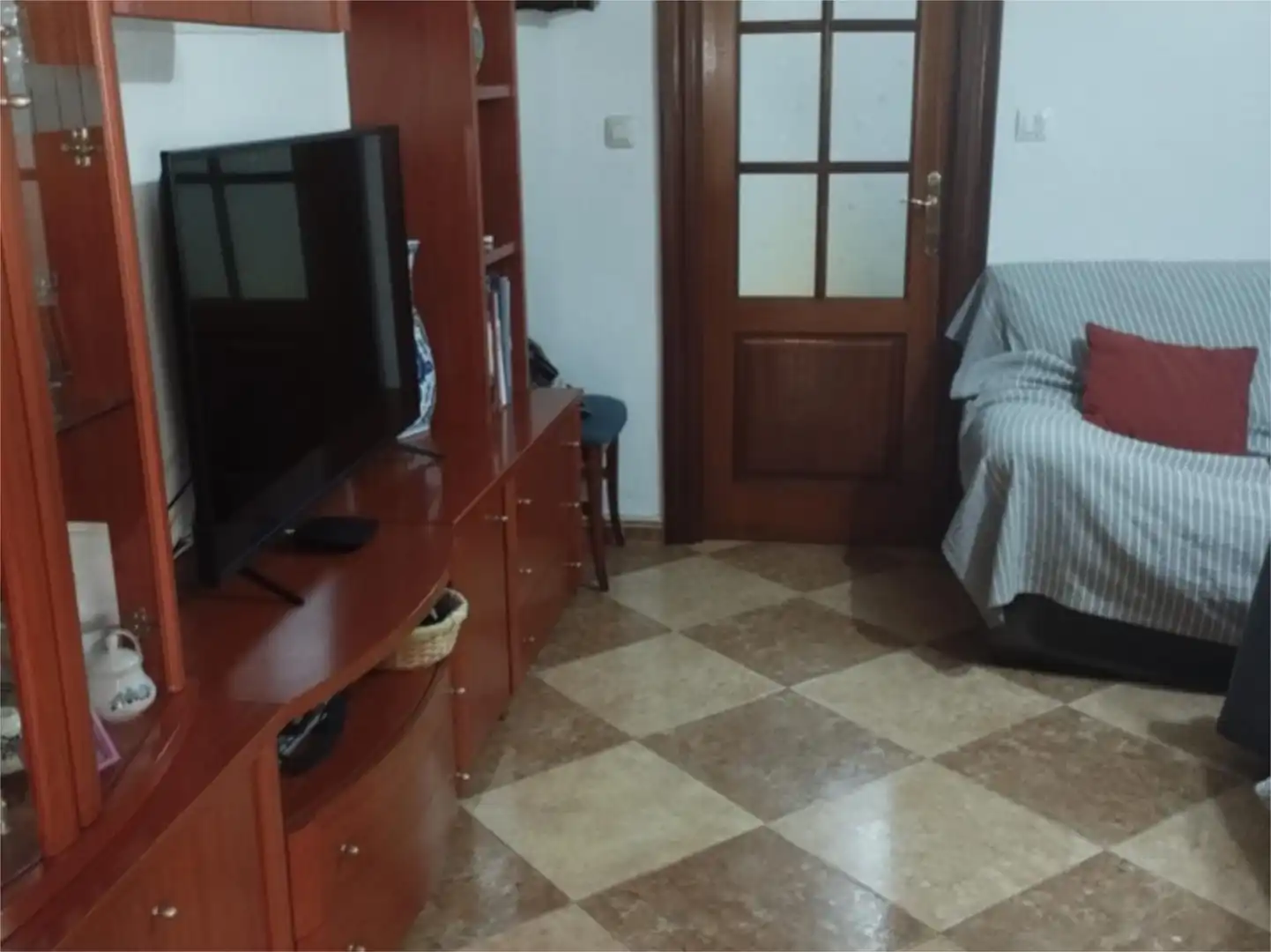 Casa adosada en venda a Avenida la Paz, 40, Alcaudete Sala d'estar de Casa adosada en venda en Alcaudete amb Aire condicionat, Calefacció i Terrassa