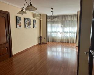 Living room of Flat for sale in  Almería Capital  with Air Conditioner and Parquet flooring