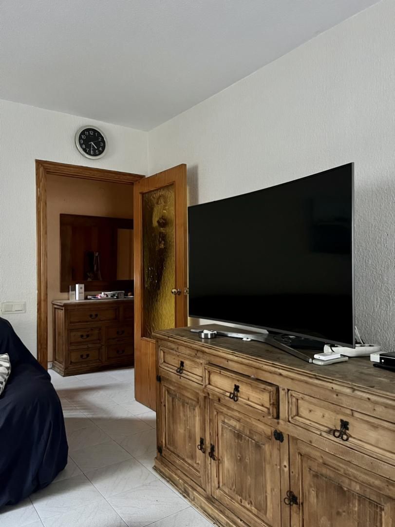 Living room of Single-family semi-detached for sale in  Almería Capital