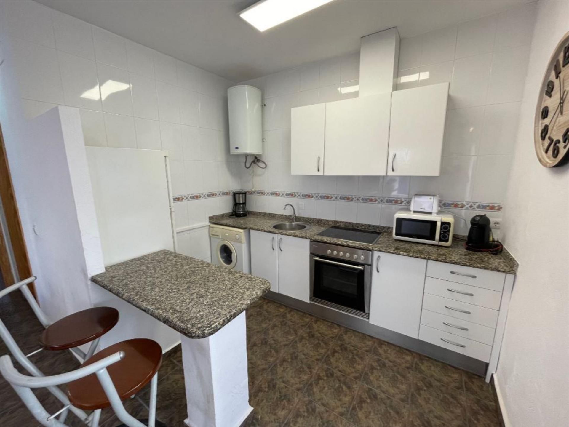Cuina de Apartament en venda en Alcalà de Xivert amb Calefacció, Jardí privat i Terrassa