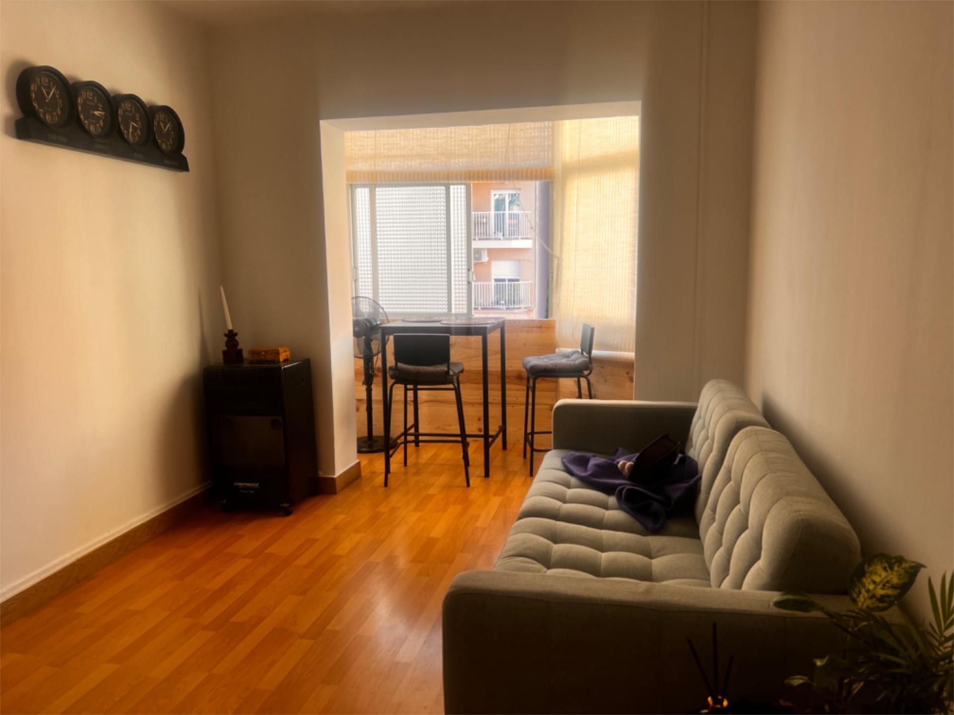 Sala d'estar de Pis per a compartir en  Barcelona Capital amb Calefacció, Parquet i Moblat