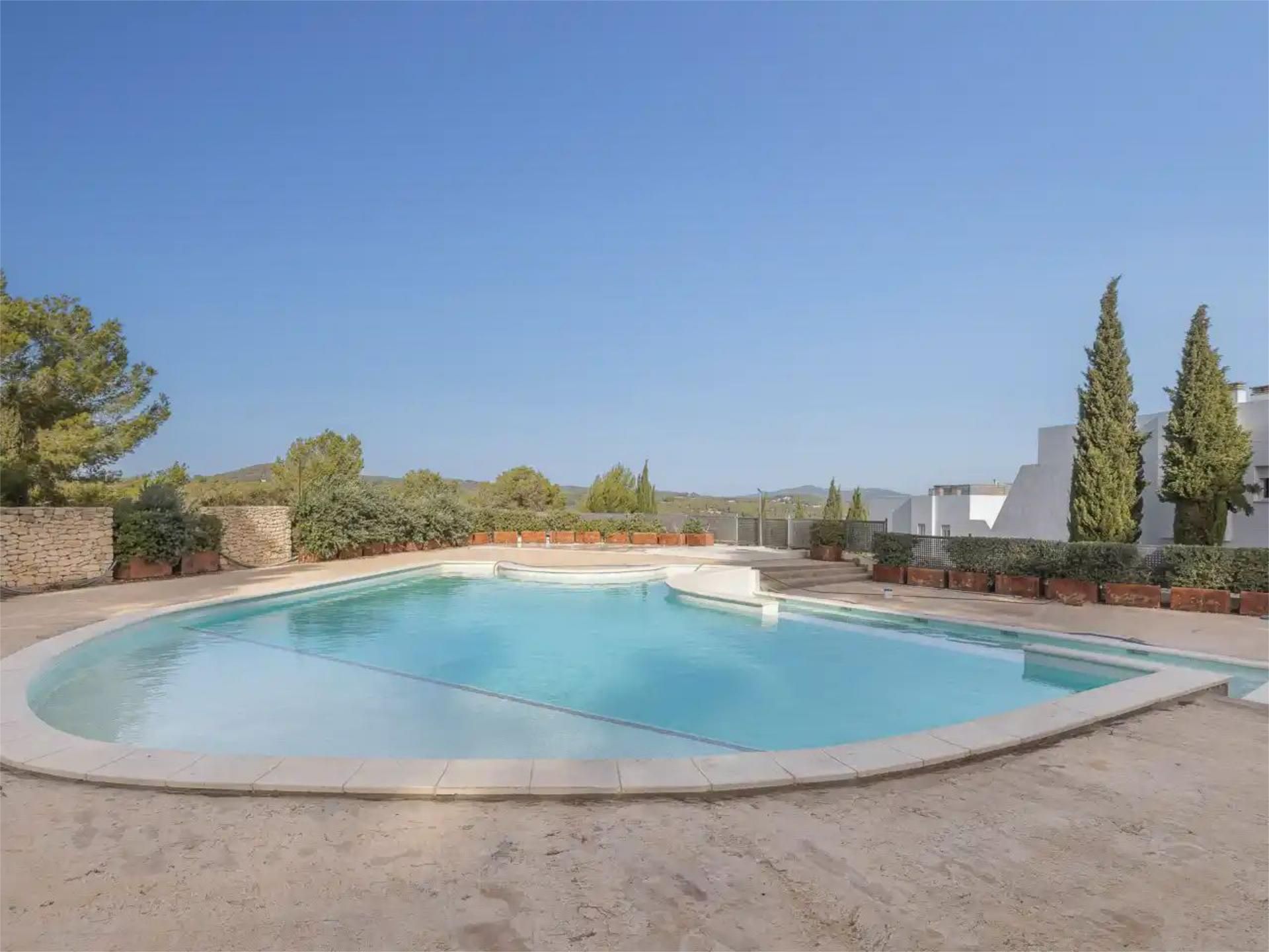 Piscina de Casa adosada de lloguer en Sant Josep de sa Talaia amb Aire condicionat i Balcó