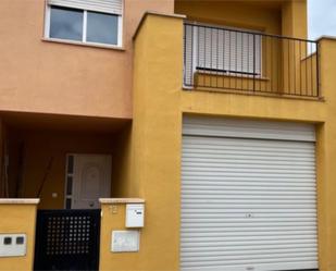 Exterior view of Single-family semi-detached for sale in Alfara de Carles  with Air Conditioner, Terrace and Swimming Pool