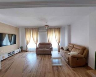 Sala d'estar de Casa adosada en venda en Don Benito amb Aire condicionat, Terrassa i Balcó
