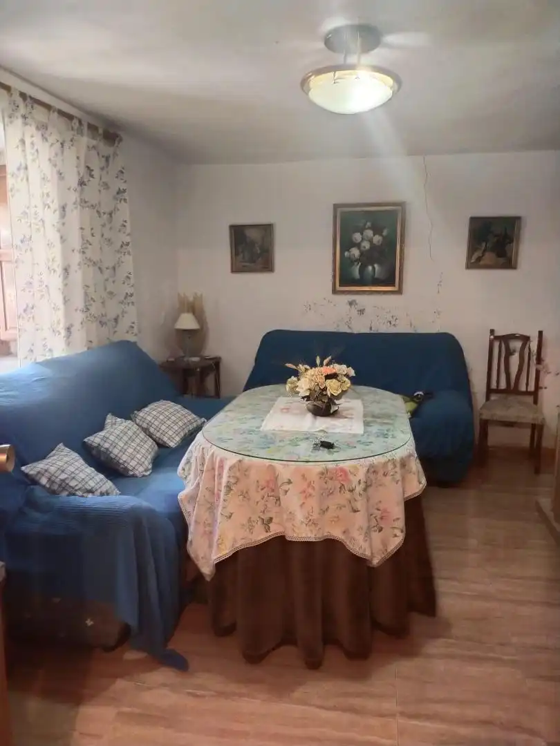 Sala de estar de Casa adosada en venta en Chimeneas