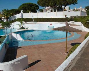 Piscina de Casa adosada de lloguer en Almonte amb Terrassa i Piscina