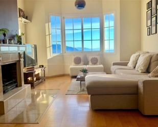 Sala d'estar de Casa adosada en venda en Ojén amb Aire condicionat, Terrassa i Balcó