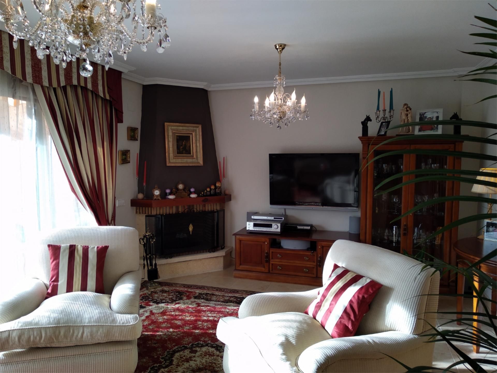 Sala d'estar de Casa adosada en venda en L'Alfàs del Pi amb Aire condicionat, Terrassa i Piscina