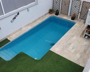 Swimming pool of Single-family semi-detached for sale in Bollullos de la Mitación  with Air Conditioner, Heating and Private garden