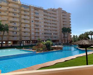 Piscina de Pis de lloguer en La Manga del Mar Menor amb Aire condicionat, Terrassa i Piscina