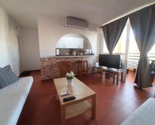 Sala d'estar de Apartament de lloguer en San Bartolomé de Tirajana amb Aire condicionat, Terrassa i Piscina