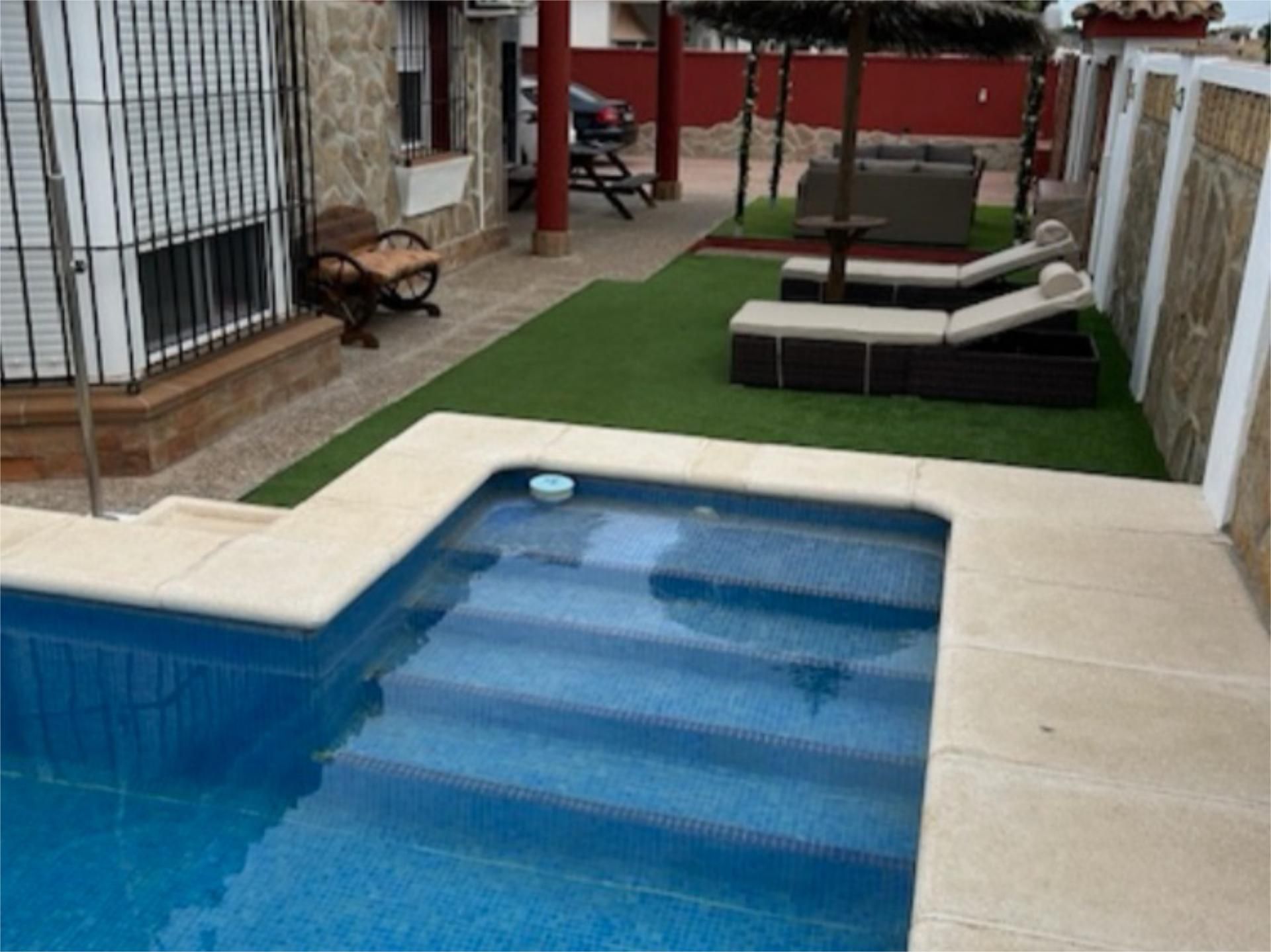 Piscina de Casa o xalet de lloguer en Chiclana de la Frontera amb Aire condicionat, Calefacció i Jardí privat