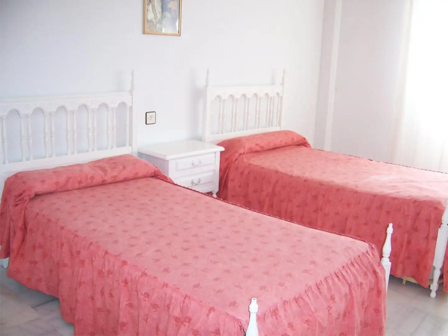 Dormitori de Casa adosada de lloguer en Salobreña amb Aire condicionat, Jardí privat i Terrassa