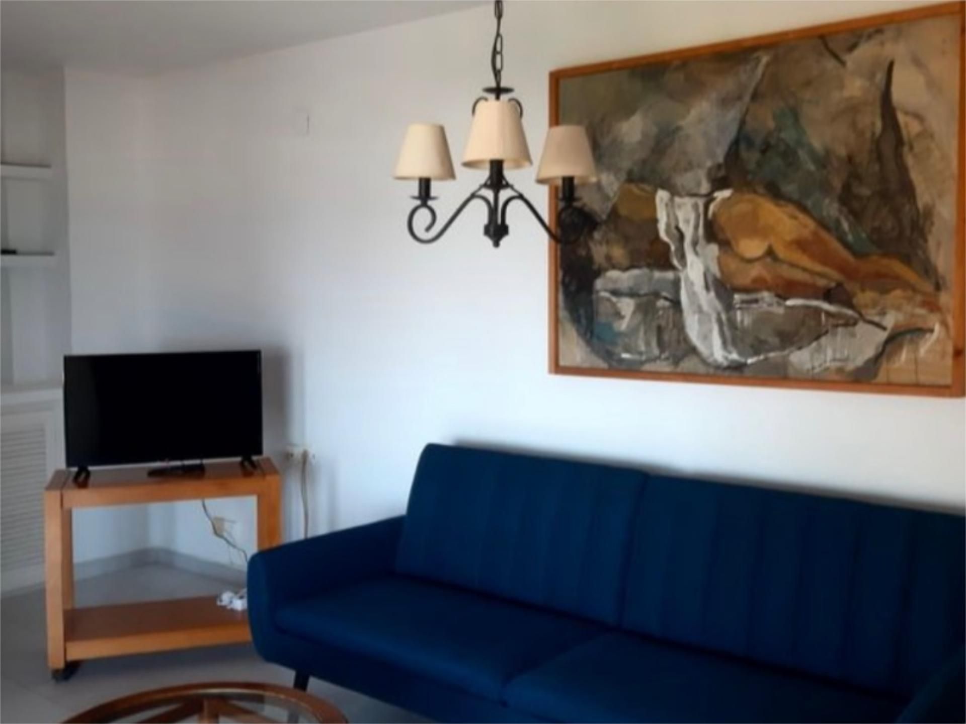 Sala d'estar de Apartament de lloguer en Salobreña amb Jardí privat, Piscina i Moblat