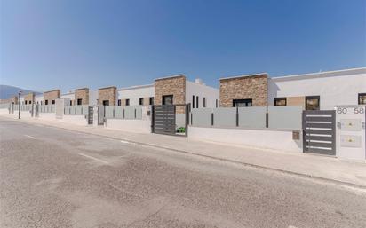 Exterior view of Single-family semi-detached for sale in  Granada Capital  with Air Conditioner, Terrace and Swimming Pool