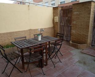 Terrassa de Casa adosada en venda en L'Alcúdia amb Aire condicionat, Terrassa i Balcó