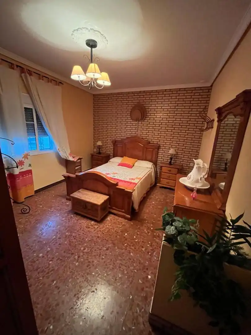 Dormitori de Casa adosada en venda en Villanueva del Río y Minas amb Aire condicionat, Calefacció i Terrassa