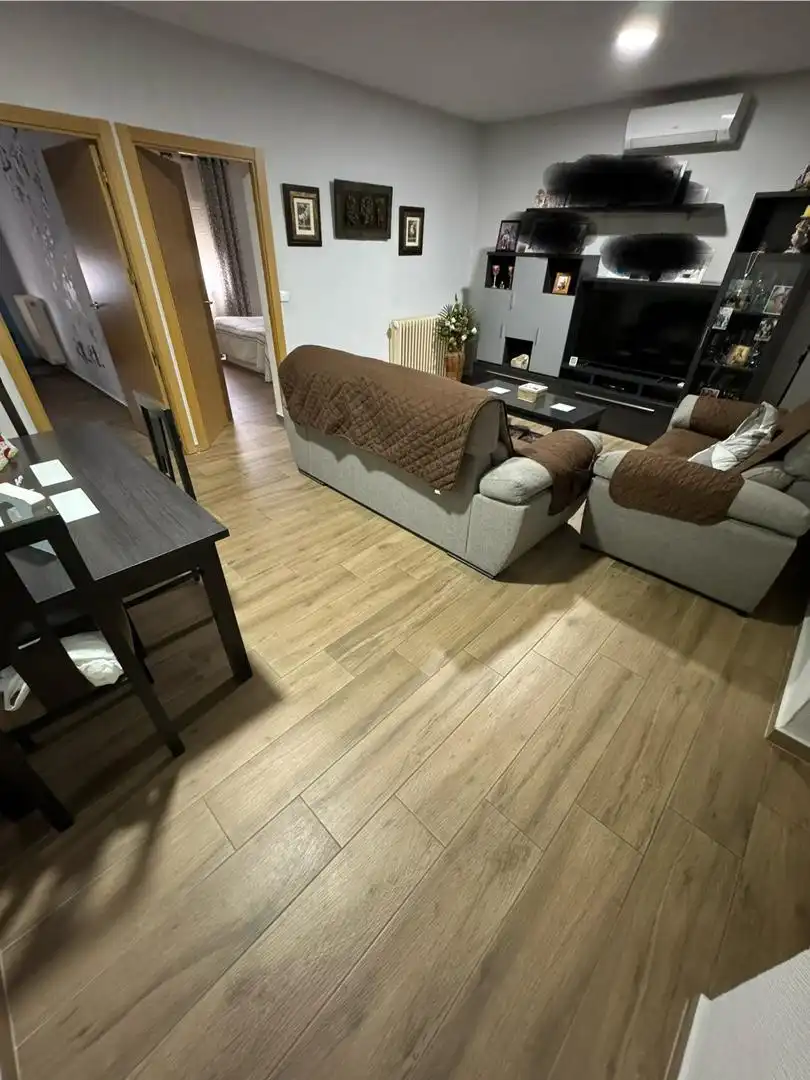 Sala de estar de Casa adosada en venta en Arenas de San Juan  con Aire acondicionado, Calefacción y Microondas