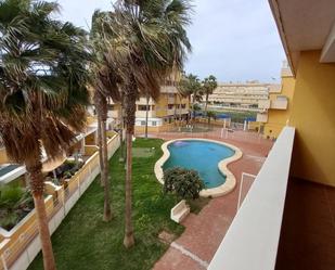 Exterior view of Flat for sale in Roquetas de Mar  with Terrace, Furnished and Community pool