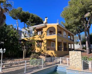 Exterior view of House or chalet for sale in Alginet  with Terrace, Swimming Pool and Balcony