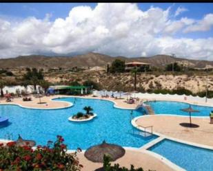 Piscina de Casa adosada en venda en El Campello amb Aire condicionat i Terrassa