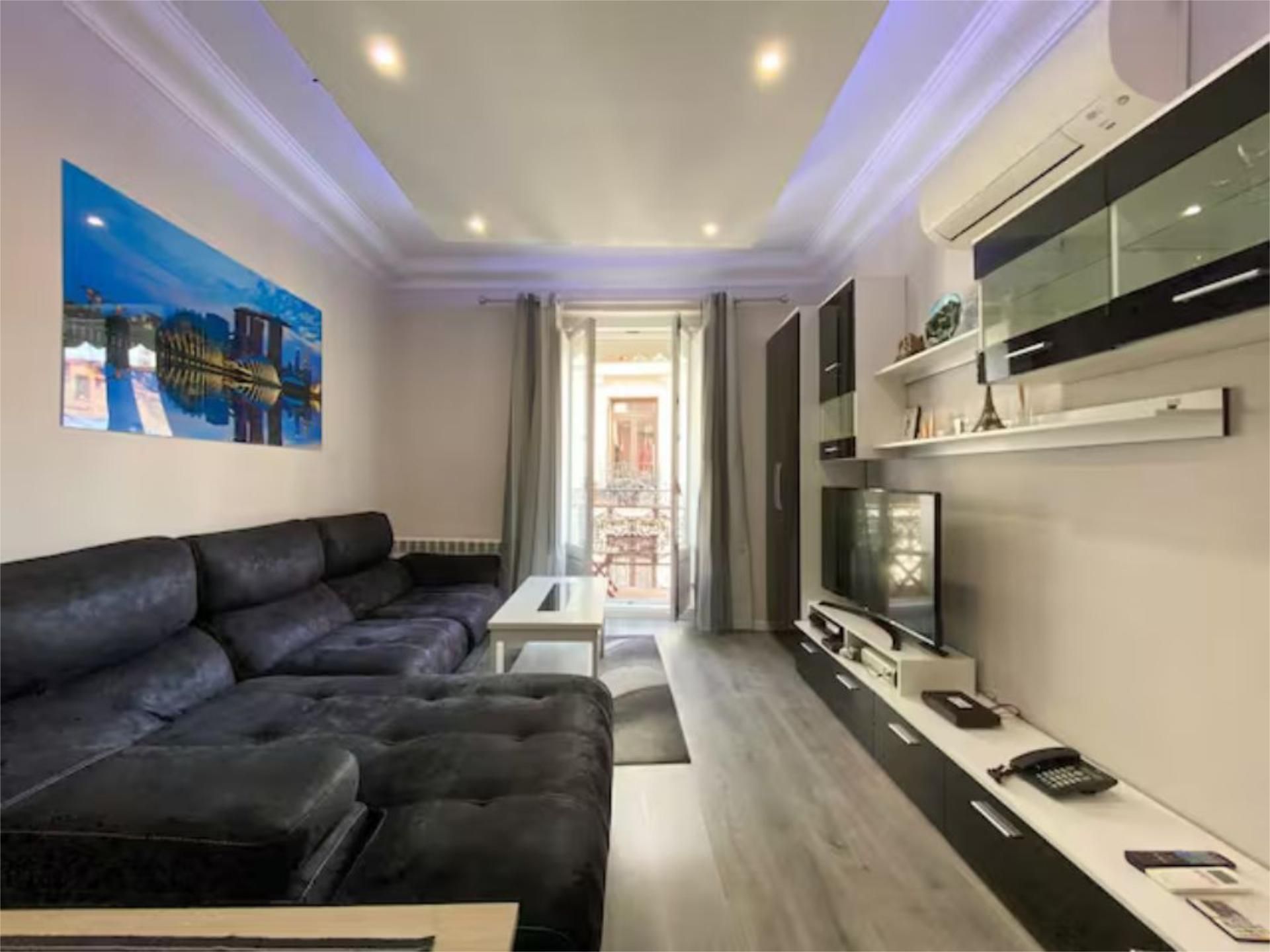 Living room of Flat for sale in  Madrid Capital  with Air Conditioner, Heating and Parquet flooring