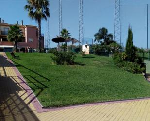 Außenansicht von Einfamilien-Reihenhaus miete in Islantilla mit Terrasse, Schwimmbad und Balkon