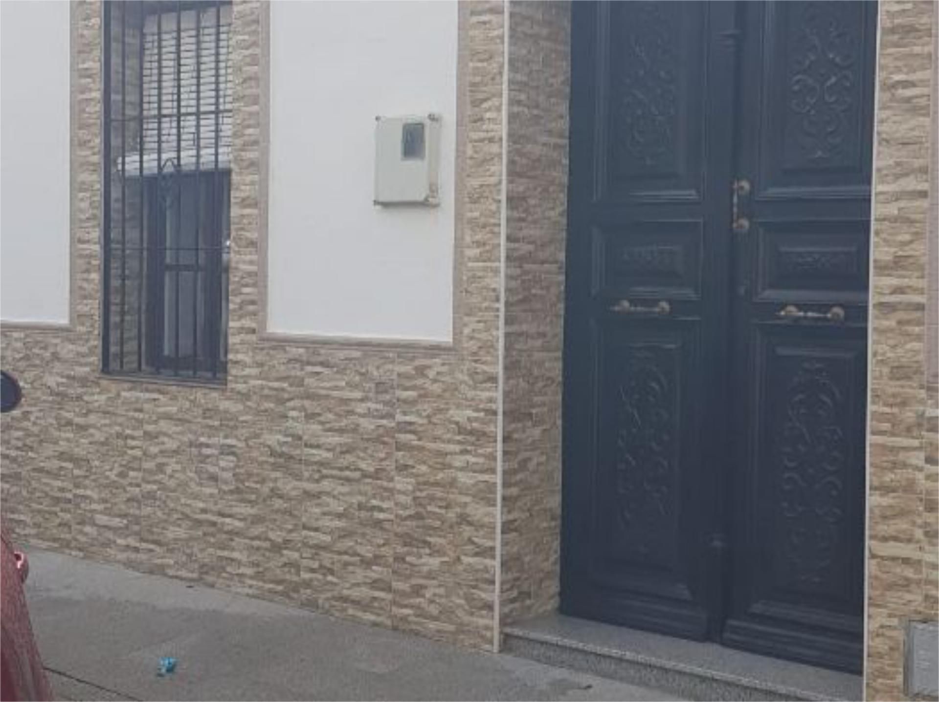 Vista exterior de Casa adosada en venda en Oliva de Mérida amb Aire condicionat i Balcó