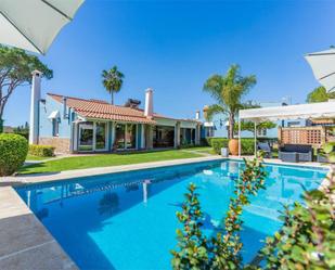 Jardí de Casa o xalet en venda en Aljaraque amb Aire condicionat, Terrassa i Piscina