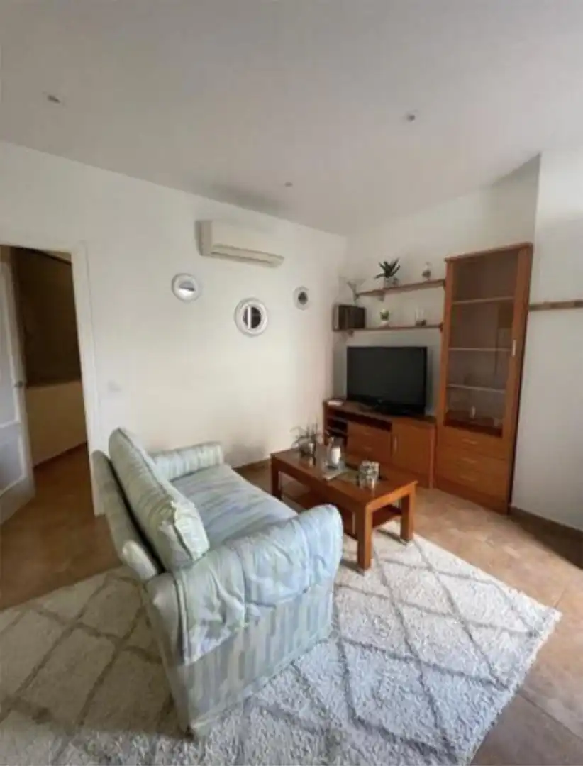 Planta baja de alquiler en Calle Muñoz Seca, 37, Los Palacios y Villafranca Sala de estar de Planta baja de alquiler en Los Palacios y Villafranca con Aire acondicionado, Calefacción y Lavadora