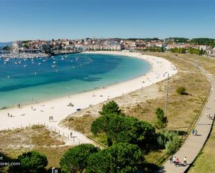 Vista exterior de Casa o xalet en venda en Sanxenxo amb Terrassa i Balcó