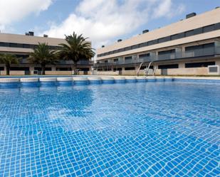 Piscina de Casa adosada de lloguer en La Pobla de Farnals amb Aire condicionat, Terrassa i Piscina