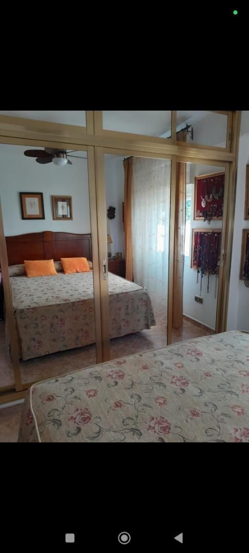 Dormitori de Pis de lloguer en Vélez-Málaga amb Jardí privat, Terrassa i Piscina