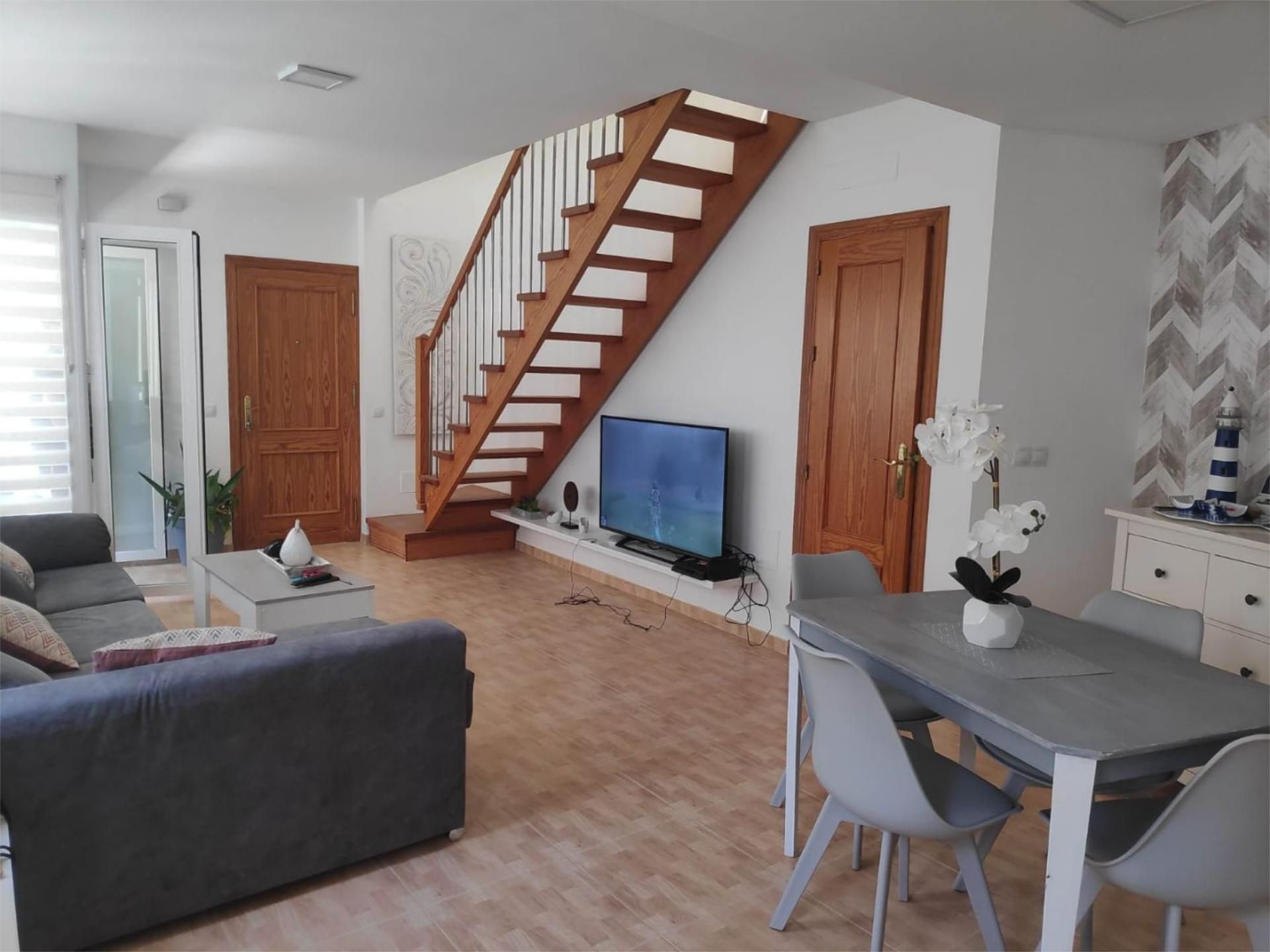 Sala d'estar de Dúplex de lloguer en Pulpí amb Aire condicionat, Calefacció i Terrassa