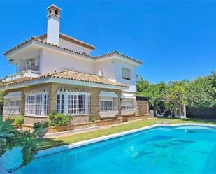 Vista exterior de Casa o xalet de lloguer en El Puerto de Santa María amb Aire condicionat, Jardí privat i Terrassa