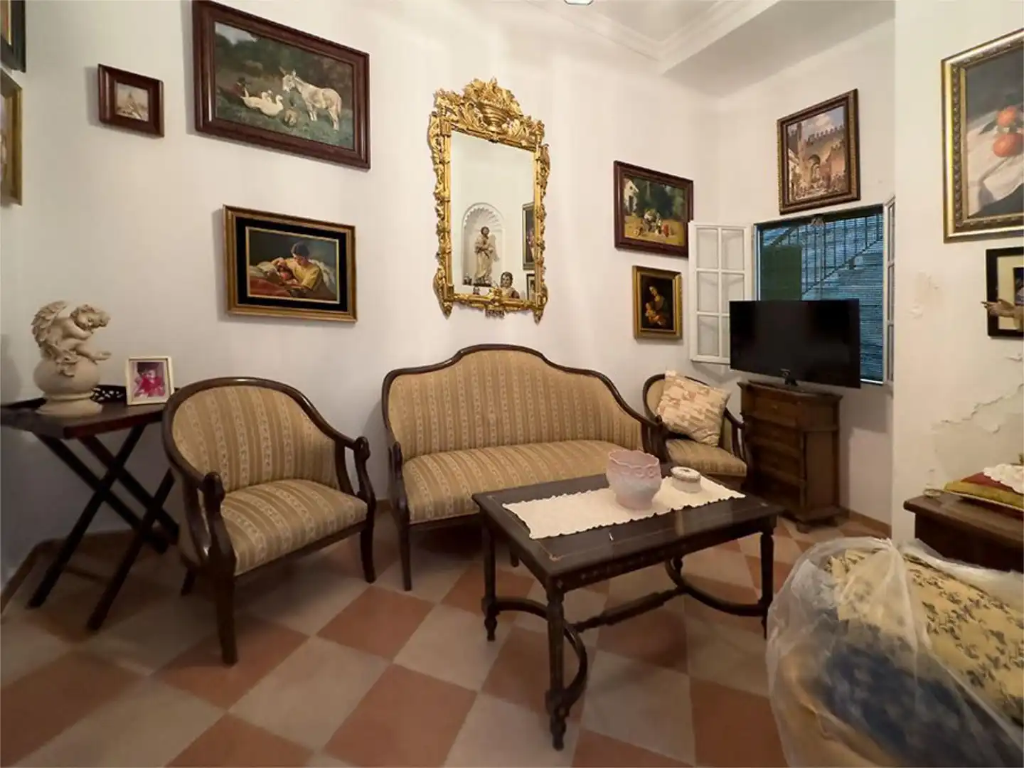 Sala de estar de Casa adosada en venta en Carmona con Terraza