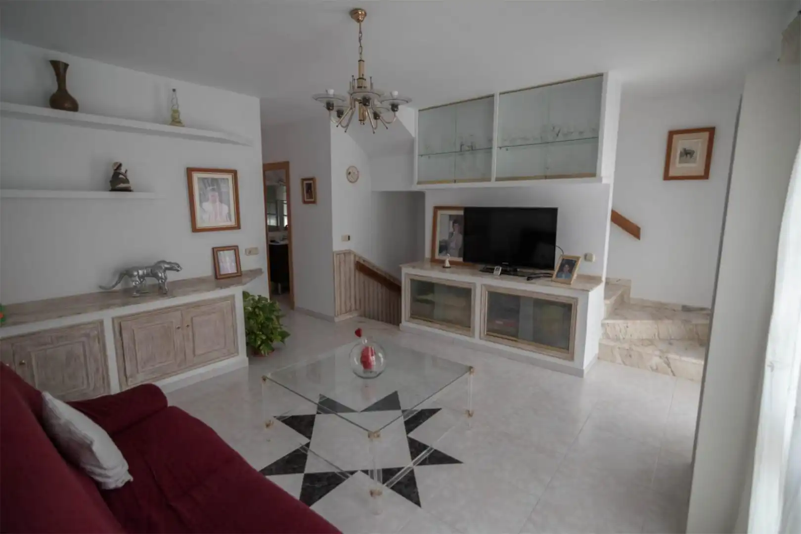 Sala d'estar de Casa adosada en venda en Mijas amb Aire condicionat, Terrassa i Balcó
