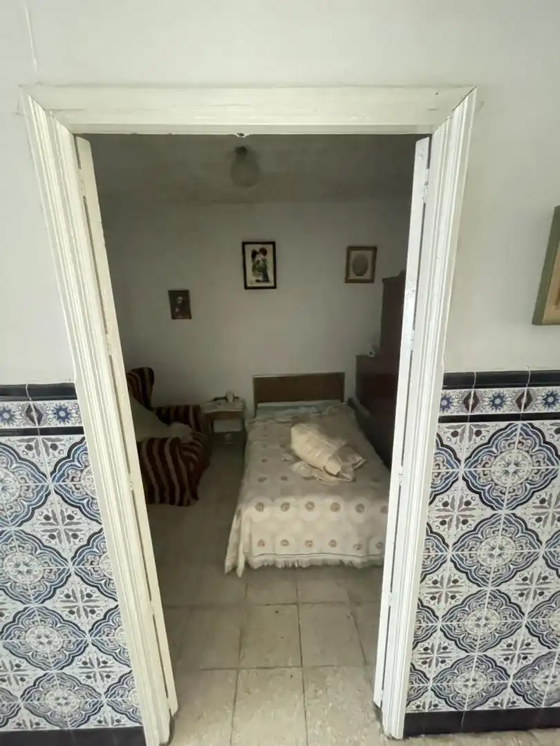Planta baixa en venda a Calle Carmen, 14, Villafranca de los Barros Dormitori de Planta baixa en venda en Villafranca de los Barros amb Aire condicionat i Jardí privat