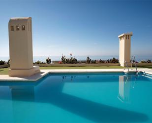 Swimming pool of Flat for sale in Estepona