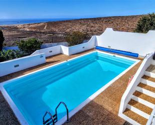 Swimming pool of House or chalet for sale in San Bartolomé  with Air Conditioner, Terrace and Swimming Pool