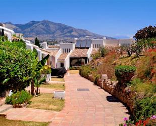 Exterior view of Single-family semi-detached for sale in Mijas  with Air Conditioner, Terrace and Swimming Pool