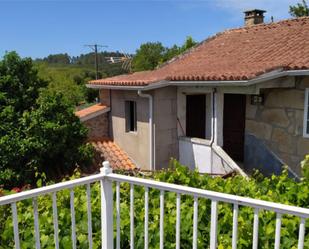 Vista exterior de Casa o xalet en venda en Ribadumia amb Terrassa i Balcó