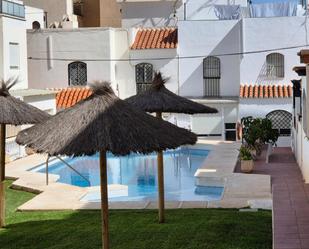 Swimming pool of Single-family semi-detached for sale in Roquetas de Mar  with Air Conditioner, Terrace and Swimming Pool