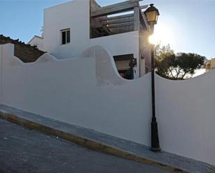 Exterior view of Single-family semi-detached for sale in Punta Umbría  with Terrace and Swimming Pool