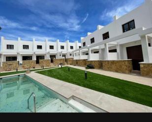 Exterior view of Duplex for sale in Níjar  with Terrace, Swimming Pool and Balcony