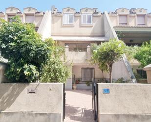 Exterior view of Single-family semi-detached for sale in Aldaia  with Air Conditioner, Terrace and Balcony